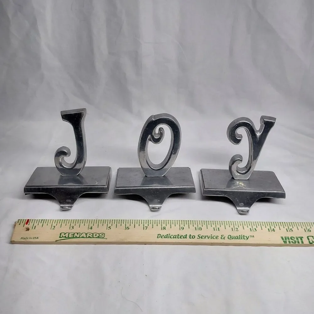 Vintage Cast Iron JOY Christmas Stocking Holders Mantel Hangers Weighted Set